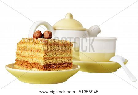 Cake with nuts and a cup of coffee