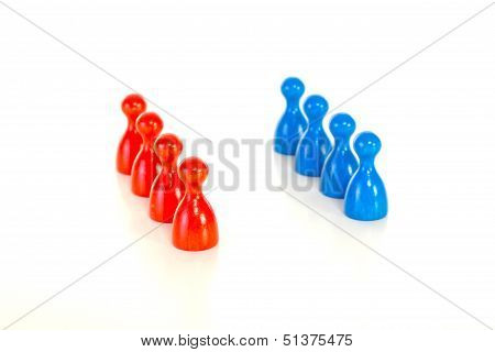 Eight Colourful Meeples Standing In Two Lines