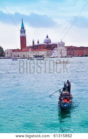 Gondolier On Gondola In Venice