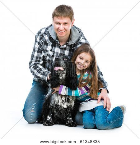 Happy cute little girl and heer daddy  with cocker spaniel puppy dog  on white background