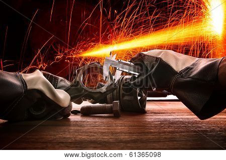 hand of worker working in heavy industy factory
