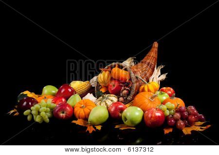 Fall Arrangement Of Fruits And Vegetables In A Cornucopia