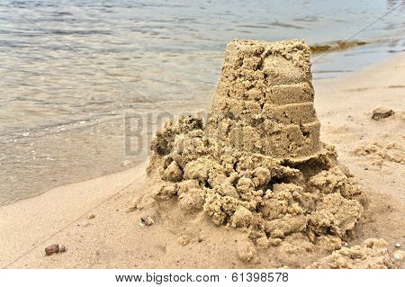 Sand pie on the river bank