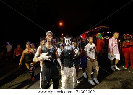 Celebrants with painted faces