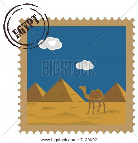 Old vintage postal stamp with Egyptian pyramids, famous landmark