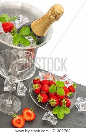 Festive Arrangement With Bottle Of Champagne And Strawberries