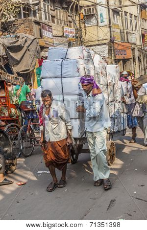 Cycle Rickshaws With Cargo Load In The Streets