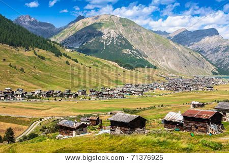 Beautiful view of the valley of Livigno in summer typical architecture for the mountain area