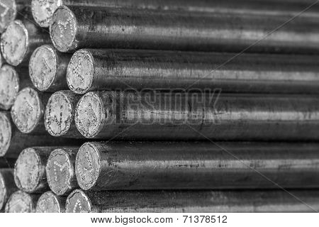 Stack Of Round Steel Bar - Iron Metal Rail Lines Material.