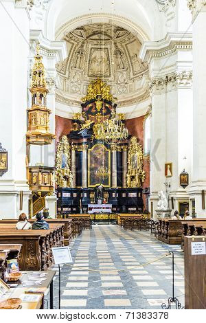 People Visit The The Church Of Saints Peter And Paul In Old Town District