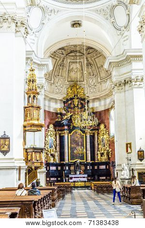 People Visit The The Church Of Saints Peter And Paul In Old Town District