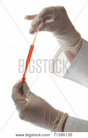 Hand With Pipette And Testtube Isolated On White