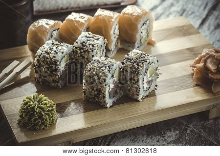Maki Sushi Set On Wooden Background