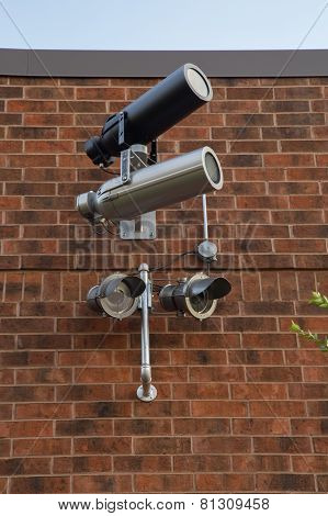 Surveillance Camera on brick wall