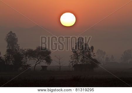 wonderful sunset on a tharu village, Bardia, Nepal