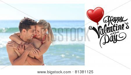 Happy lovers at the beach against cute valentines message