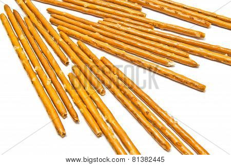 Many Salted Breadsticks On White