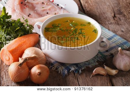 Chicken Broth And Ingredients On The Table Close-up. Horizontal