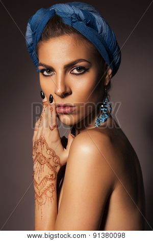 Beautiful Sexy Blonde Woman With Make Up And Mehendi Tattoo Topless On Dark Background