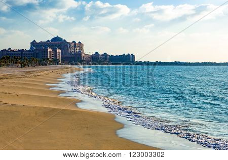 Abu Dhabi, U.A.E. the Emirate Palace on the beach seen from the Breackwater  seafront.