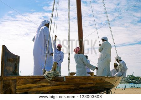 Abu Dahbi,  U.A.E. - February 22, 2007:  Preparation works of feluccas racing in the Marina Sporting Club.