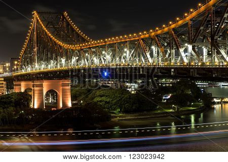 Brisbane Story Bridge by night close up, with light streaks left by the City Council River Cats