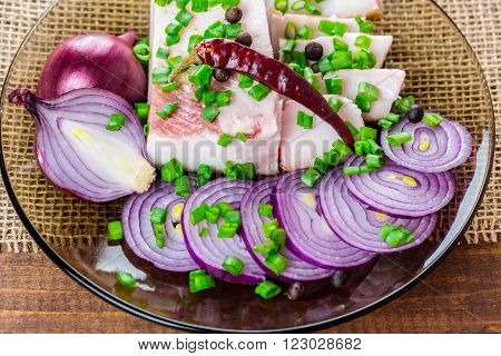 Fresh Pork Fat, With Red Hot Chili Peppers, Green And Purple Onions And  Peas Allspice Beautifully L