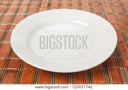 The symbolic white dishes on a bamboo litter.