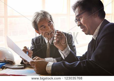 couples of senior partner business man meeting with serious problem solution planing crisis decision in office meeting room