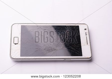 Phone drop to the floor and screen damage broken on white background