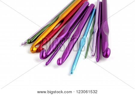 Multicolored crotchets of different size on white background