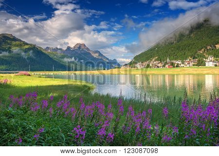 Amazing sunny day at Champferersee lake in the Swiss Alps. Silvaplana village, Switzerland, Europe.