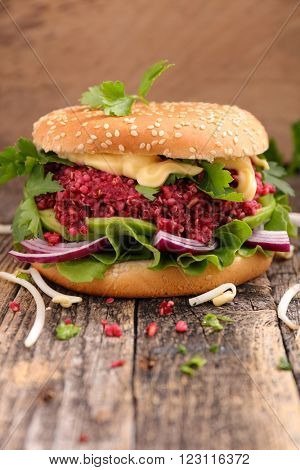 buger with quinoa and beetroot steak