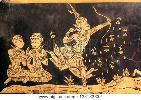 BANGKOK, THAILAND - FEB 14: Vintage mural of Wat Pho temple with talking women and brave warrior in traditional dress on February 14, 2015. Wat Pho is a Buddhist temple complex founded in 16th century