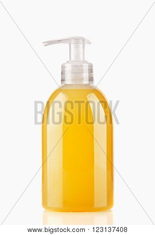 yellow soap dispenser isolated on white background