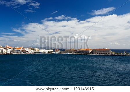 SYROS, GREECE - MARCH 06, 2016: Town of Ermoupoli on Syros island as seen from the ferry on March 04, 2016.