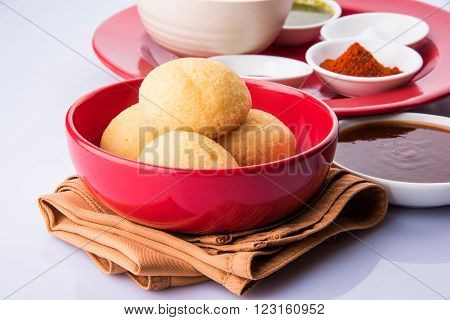 dahi vada or dahi vade also known as Curd Vadai in South India, a popular snack famous all over India prepared by soaking lentil vadas in thick dahi or yogurt, topped with spicy & sweet chutney etc