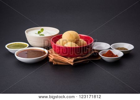 dahi vada or dahi vade also known as Curd Vadai in South India, a popular snack famous all over India prepared by soaking lentil vadas in thick dahi or yogurt, topped with spicy & sweet chutney etc