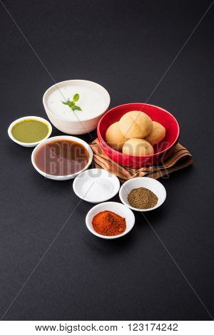 dahi vada or dahi vade also known as Curd Vadai in South India, a popular snack famous all over India prepared by soaking lentil vadas in thick dahi or yogurt, topped with spicy & sweet chutney etc