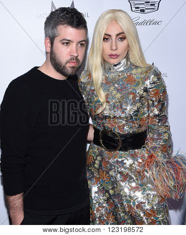 LOS ANGELES - MAR 20:  Brandon Maxwell & Lady Gaga arrives to the 2nd Annual Fashion Los Angeles Awards  on March 20, 2016 in Hollywood, CA.                