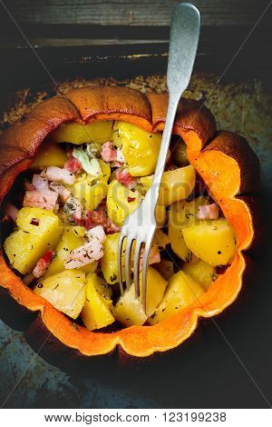 Baked  pumpkin with potato and bakon  in the whole pumpkin