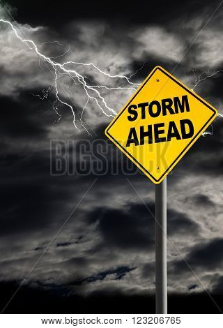 Storm Ahead warning sign against a dark cloudy and thunderous sky. Concept of political storm personal crisis or imminent danger ahead. Vertical orientation