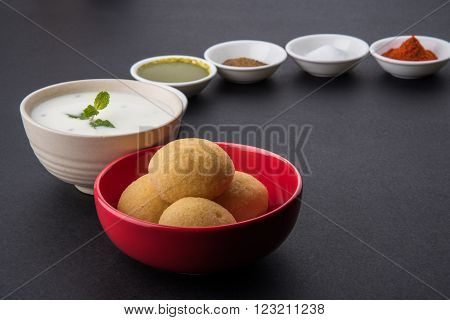dahi vada or dahi vade also known as Curd Vadai in South India, a popular snack famous all over India prepared by soaking lentil vadas in thick dahi or yogurt, topped with spicy & sweet chutney etc