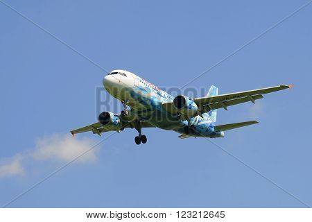 ST. PETERSBURG, RUSSIA - JUNE 29, 2015: Flying the Airbus A319-111 (VQ-BAS) of airline 
