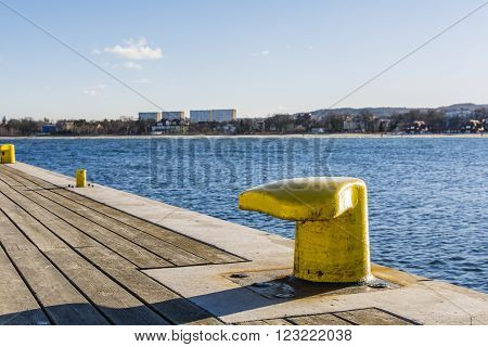 Yellow bitts on the waterfront (Sopot Pier).