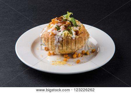 Rajasthani Shahi Raj Kachori, stuffed katchori with potato and sprout filling and served with curd, chutney and sev