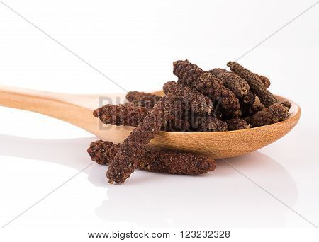 closeup long pepper on white background. food