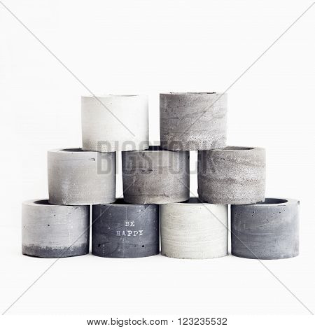 Handmade concrete planters for succulents in grey shades. Scandinavian minimalistic design for home.