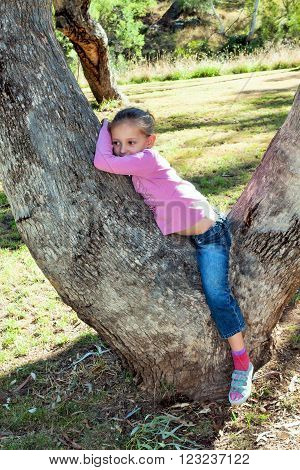 Little girl playing in the park, child in a park