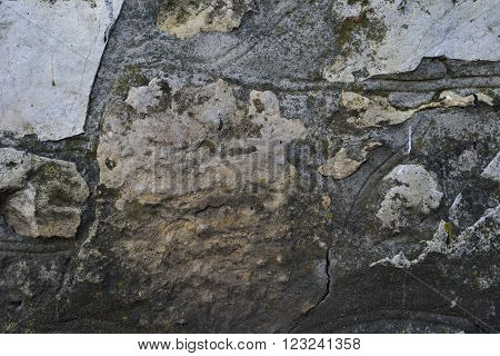 stone wall with moss in the cracks